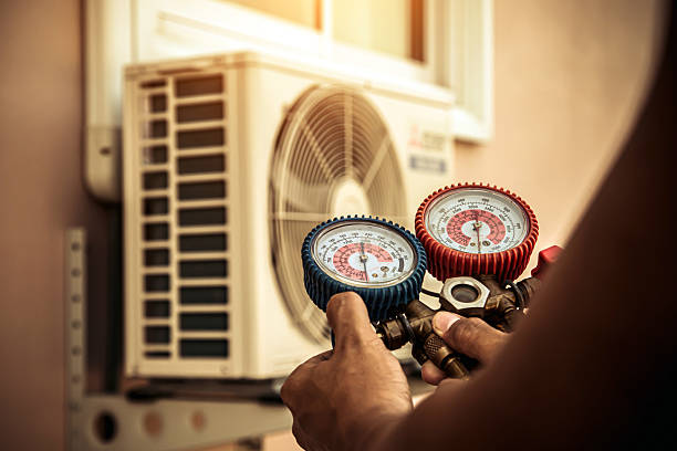 Professional Air Conditioning Service technician working in Chickasaw, OH